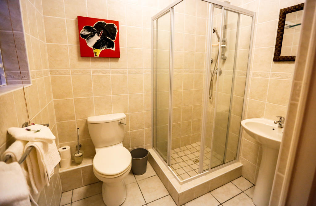 シークレット ガーデン ゲストハウス ブロウベルフストランド 部屋 写真